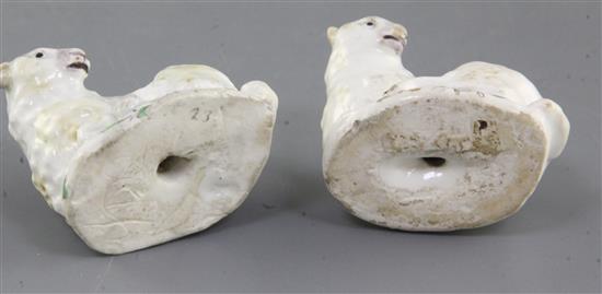 Two early Bow figures of young goats lying recumbent, c.1752-5, l. 5.5cm, ears and horns restored